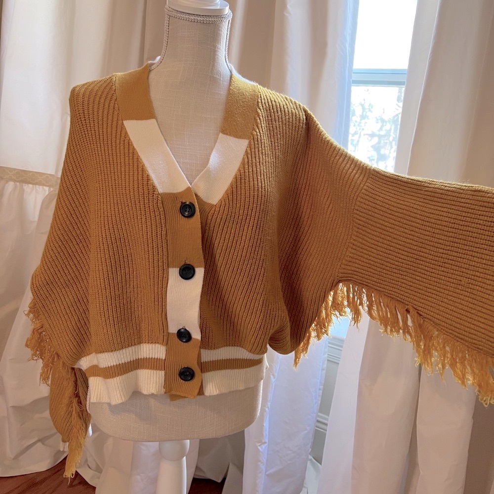 JJ fairy land size small gold sweater with fringe.